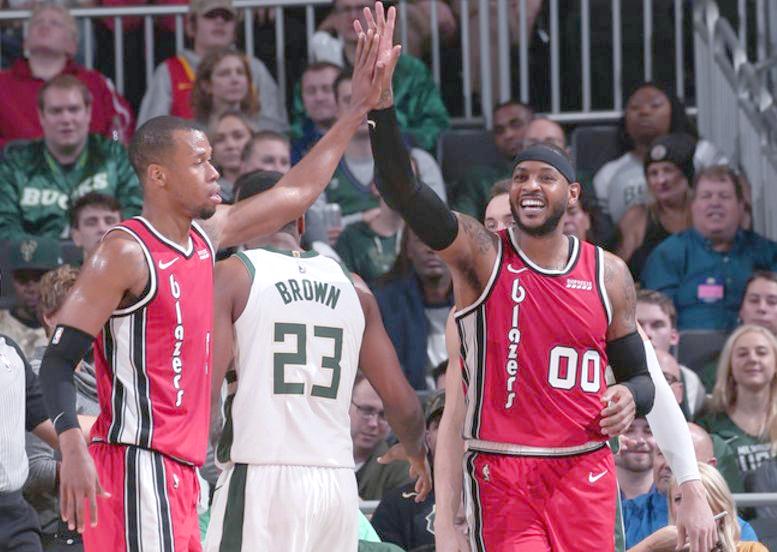 雄鹿队在客场比赛中大胜开拓者队 雄鹿队在客场比赛中大胜开拓者队